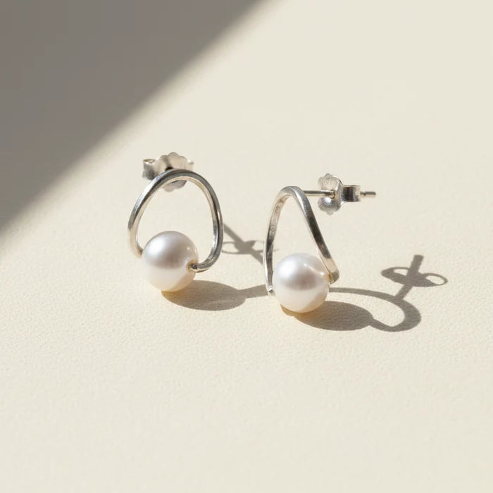 Silver-tone circle hoop earrings with white pearl drop studs