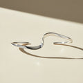 Silver bracelet on a white background