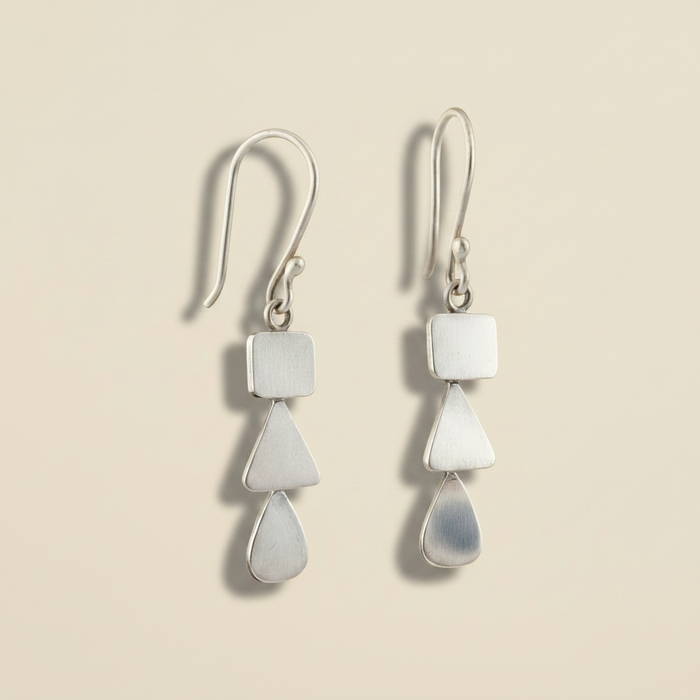 Silver-tone dangle earrings with square, stacked teardrop drops on lever hooks