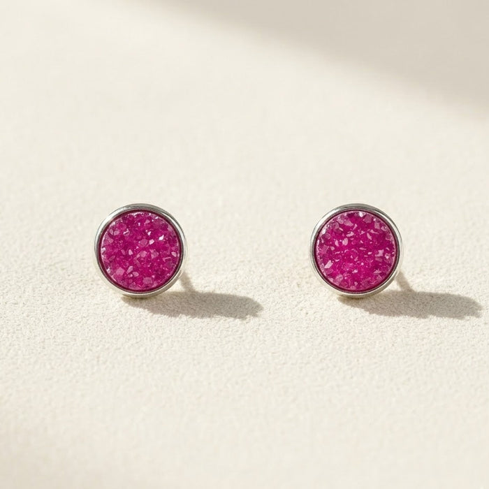 Round druzy stud earrings with pink-magenta stone, silver-tone bezel, post-back closure