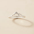 Silver mountain ring with raised peak and snowcap design