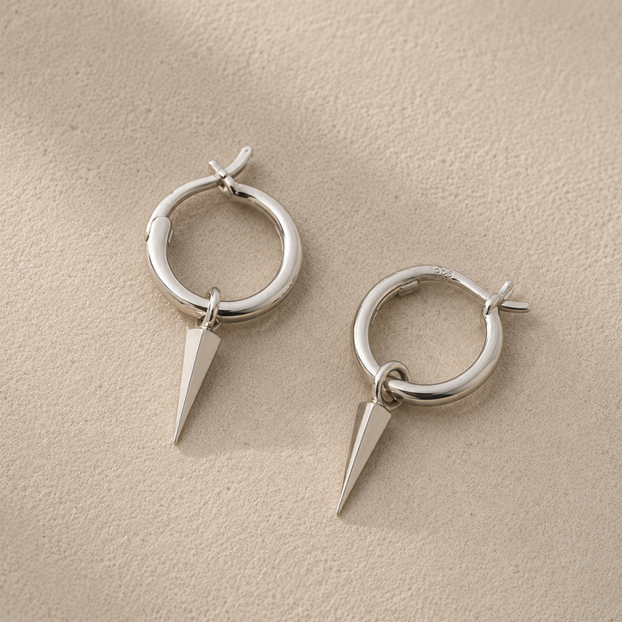 Silver spike hoop earrings with pointed drop charm