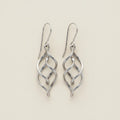 Silver-tone ribbon dangle earrings with open spiral scroll design and fishhook backs