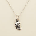 Silver bead chain necklace with wing charm pendant