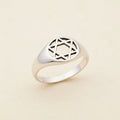 Sterling silver tone signet ring with engraved geometric star motif top