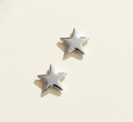 Star stud earrings with five-point silver-tone stars