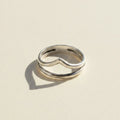 Silver-tone stacked rings with curved cutout center