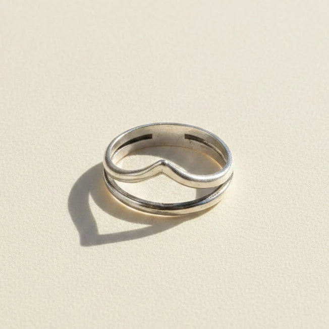 Silver-tone stacked rings with curved cutout center