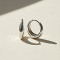Silver teardrop huggie hoop earrings