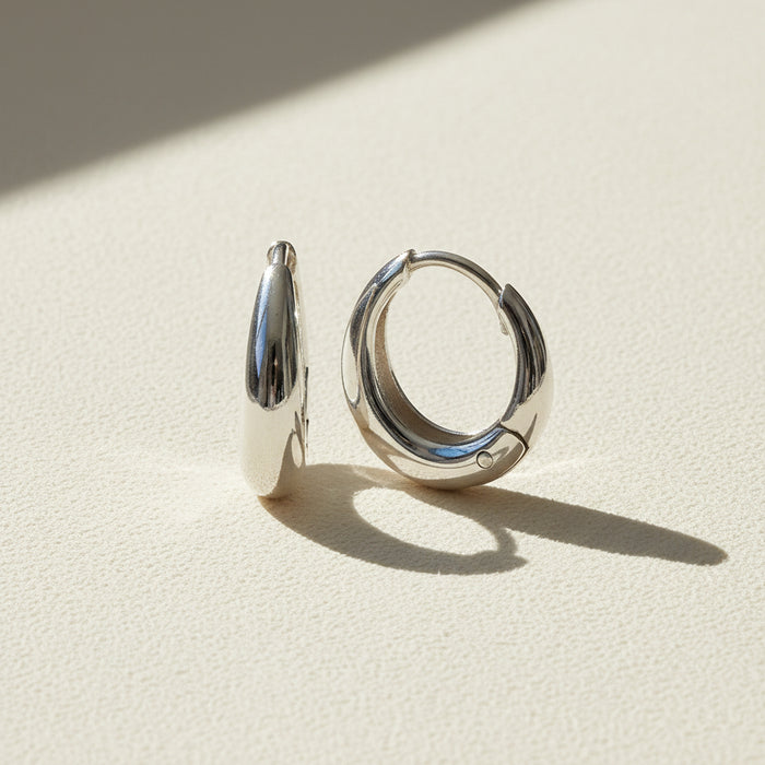 Silver teardrop huggie hoop earrings
