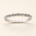 925 sterling silver ring with tiny flower motifs along slim band