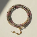 Multistrand tourmaline bead wrap bracelet/necklace with gold-tone toggle clasp and charm