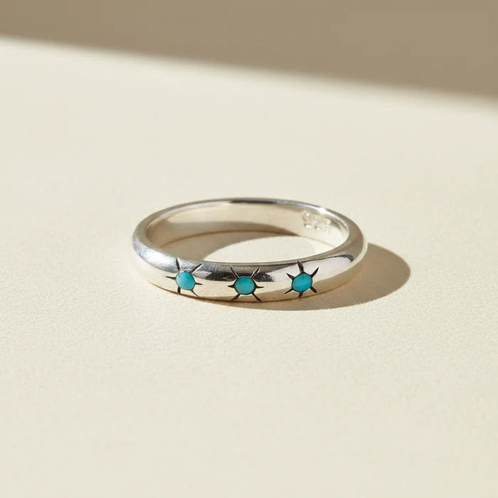 Silver trio ring with three turquoise gemstone accents