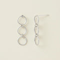 Triple loop hoop post earrings, three linked round hoops in silver-tone metal
