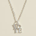 Silver-tone vote necklace with VOTE letter pendant and link chain