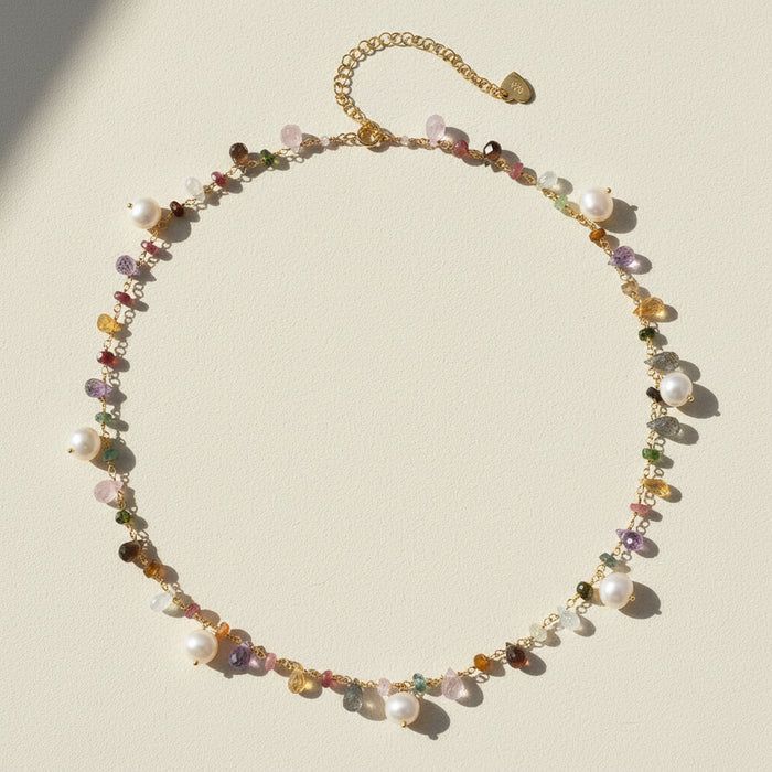 Gold-tone freshwater pearl choker necklace with multicolor beads and dangling charms