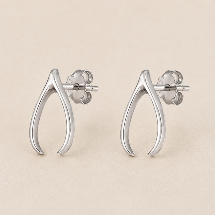 Silver teardrop wishbone stud earrings with butterfly back posts